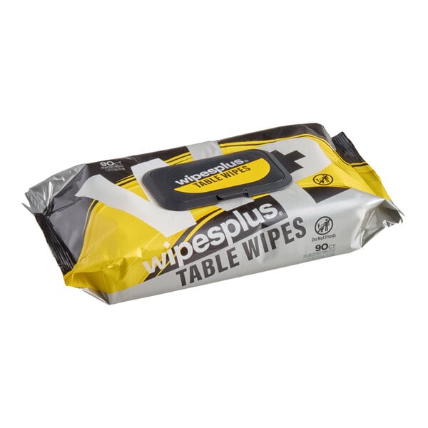 A package of WipesPlus table wipes with a yellow, white, and gray design and a resealable plastic lid.