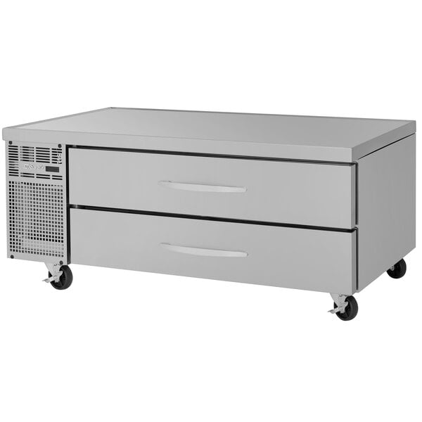 A stainless steel Turbo Air chef base with two drawers on wheels.