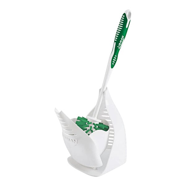 A white and green Libman toilet brush in a closed caddy.