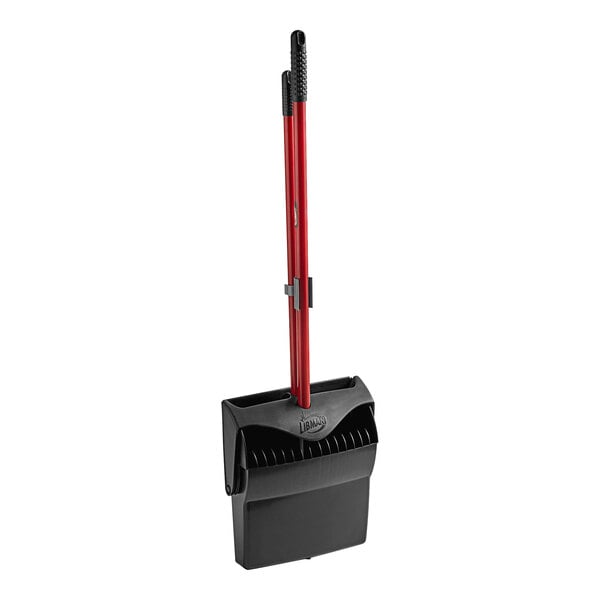 A black and red Libman lobby broom with a red handle and open-lid dustpan.