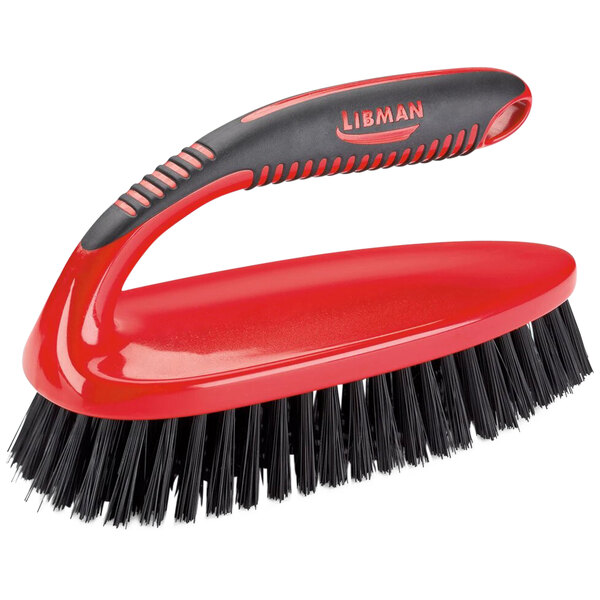 A close up of a red and black Libman Big Red Scrub Brush with a handle.