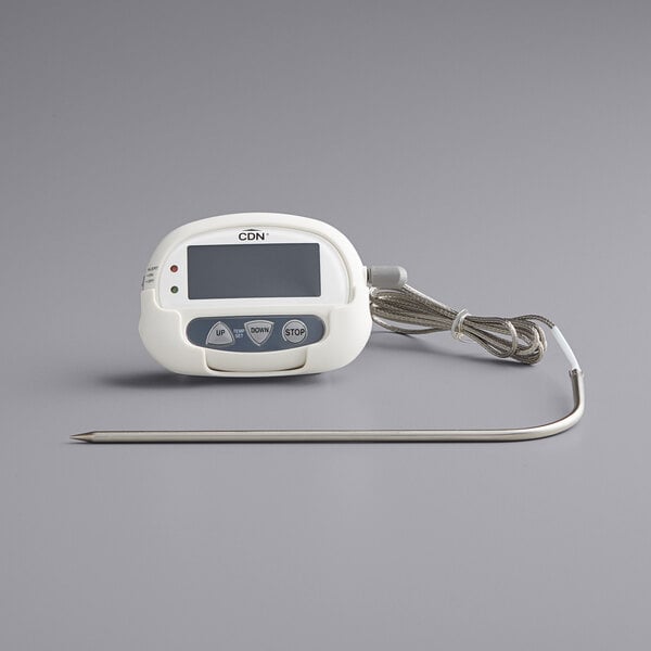 A white CDN digital cooking probe thermometer with a long wire.