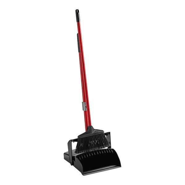 A red and black Libman deluxe lobby broom and dustpan.