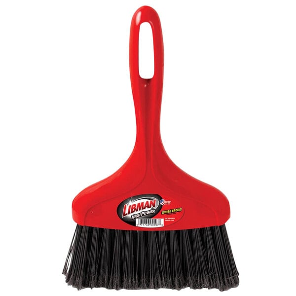 A red Libman whisk broom with black bristles and a black handle.