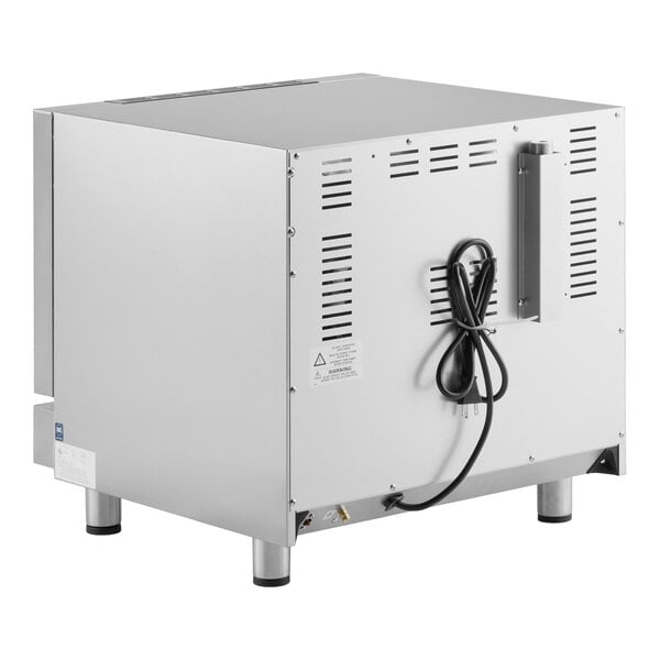 A stainless steel half size electric convection oven with mechanical controls and a power cord attached to the back.
