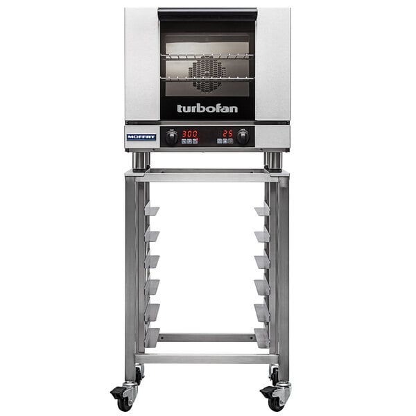 A silver and black Moffat Turbofan convection oven on wheels.