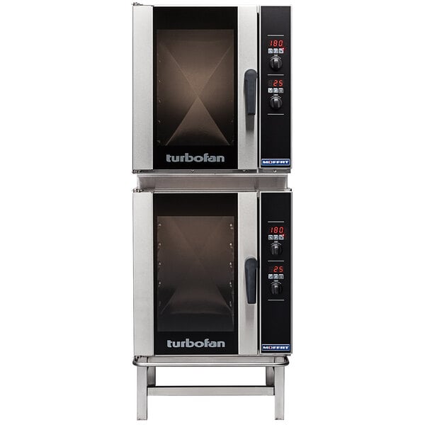 A white Moffat double stacking kit with adjustable feet for two convection ovens.