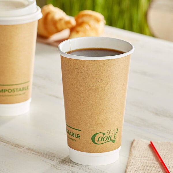 Two EcoChoice brown paper hot cups on a table.