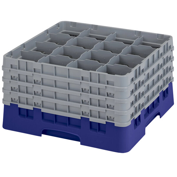 A navy blue plastic Cambro glass rack with 16 compartments.