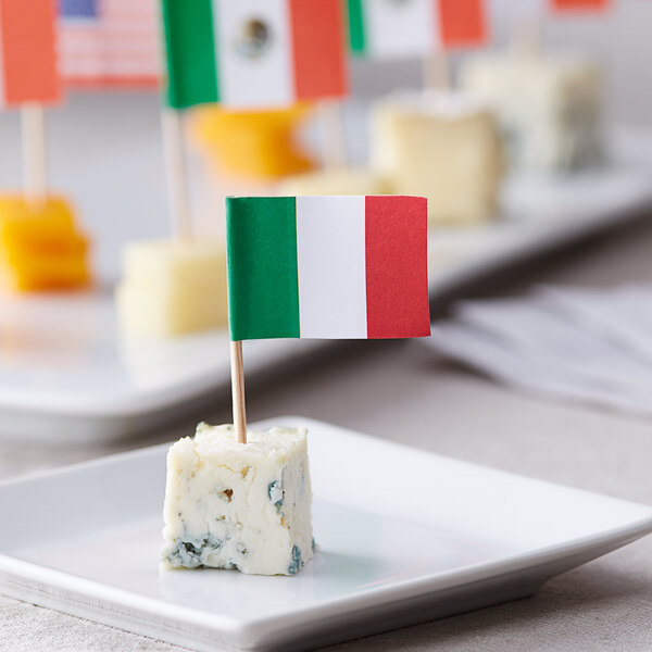 A plate of cheese sticks with Italian flag picks.