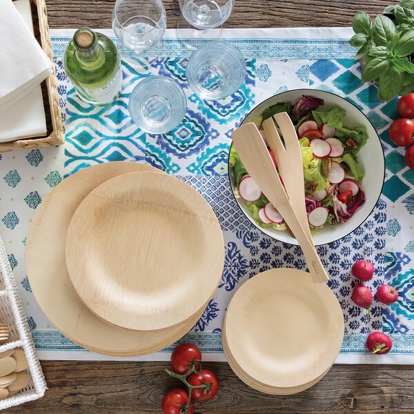 A table set with Bambu Bamboo plates and salad.