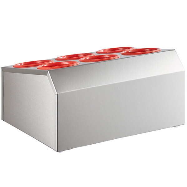 A stainless steel flatware organizer with red perforated plastic cups inside.