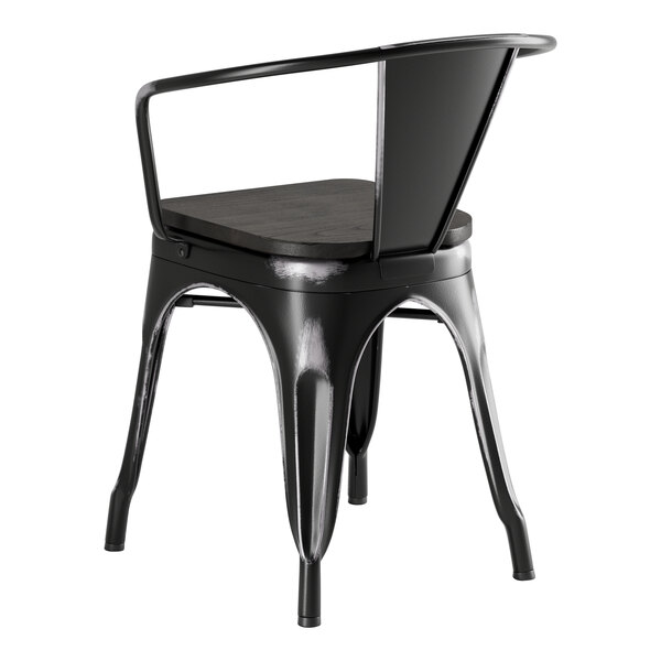 A Lancaster Table & Seating black metal arm chair with a black wood seat.