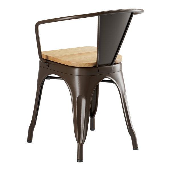 A Lancaster Table & Seating metal arm chair with a natural wood seat.