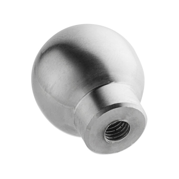 A close-up of a round silver knob with a nut on it.