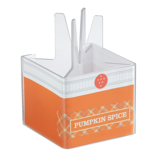 A clear plastic waffle cone stand with orange pumpkin spice-themed labeling.