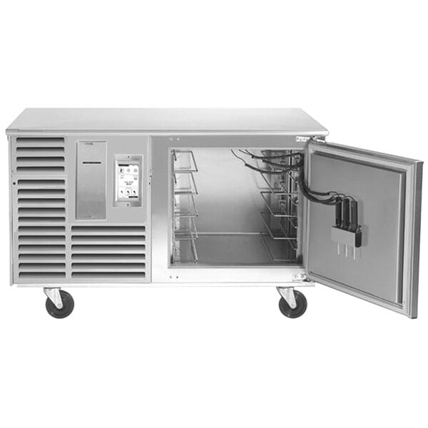 A Traulsen stainless steel undercounter blast chiller with a door open.