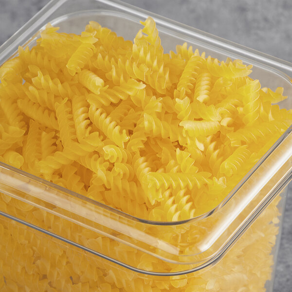 A case of Barilla Gluten-Free Rotini Pasta on a table.