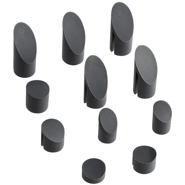 A group of black AvaMix hole covers.