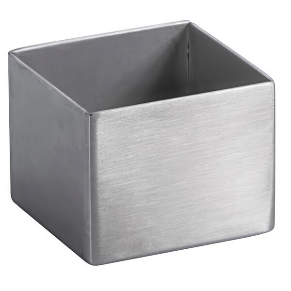 A silver stainless steel square ramekin with a lid.