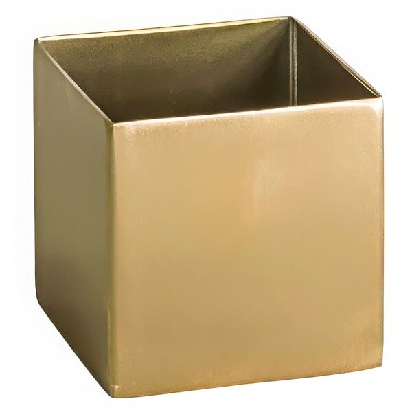 A gold brushed stainless steel square ramekin.