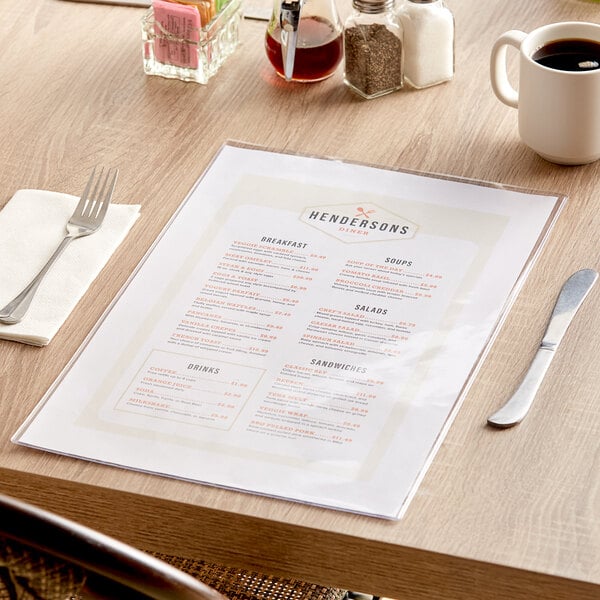 A clear vinyl menu on a table