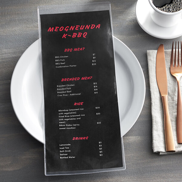 a menu on a plate with a cup of coffee and a napkin