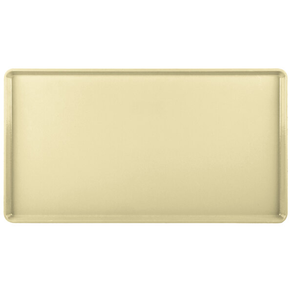 A rectangular beige tray with a white border.