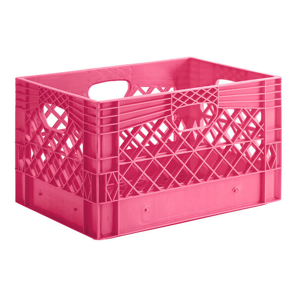 A pink plastic rectangular milk crate with handles.