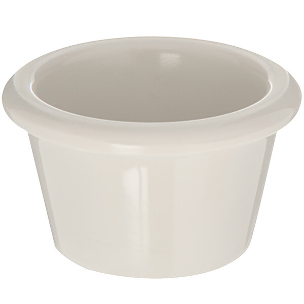 A white Carlisle ramekin with a rim on a white background.