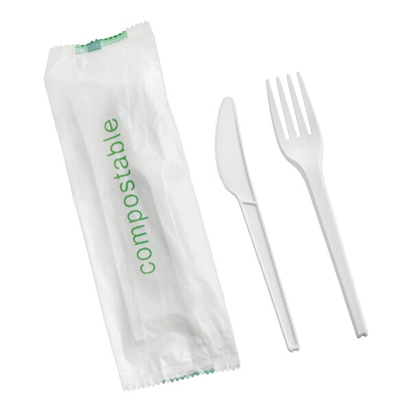 A set of white compostable heavy weight knife and fork with individual wrapping.