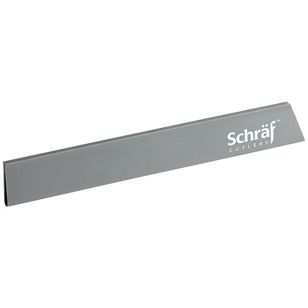 A gray rectangular Schraf polypropylene blade guard with white text.