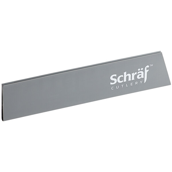A grey rectangular Schraf polypropylene blade guard with white text.