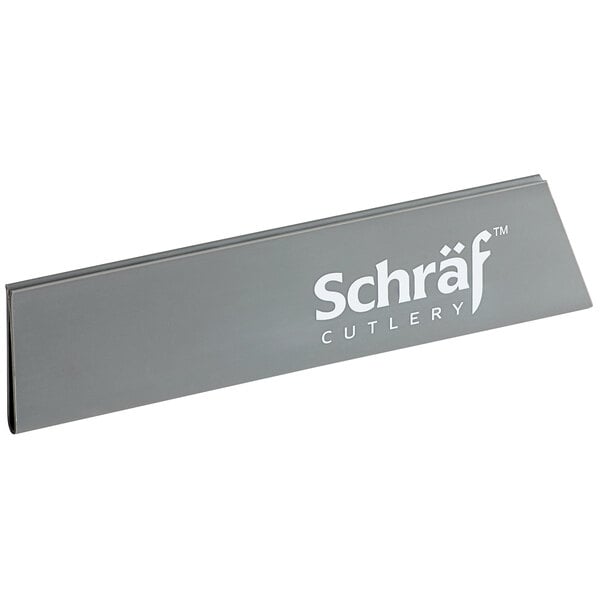 A grey Schraf polypropylene blade guard with white text.
