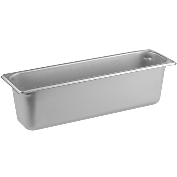 A Vigor stainless steel long hotel pan on a counter.