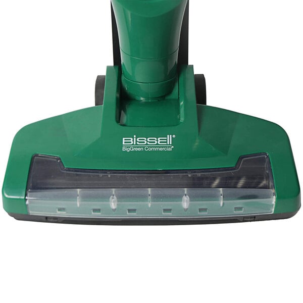 A green Bissell upright / handheld vacuum cleaner with a handle.