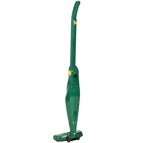 A green Bissell upright and handheld vacuum cleaner with yellow accents.