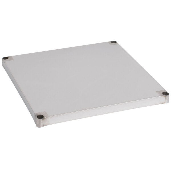 A white rectangular object with metal corners.