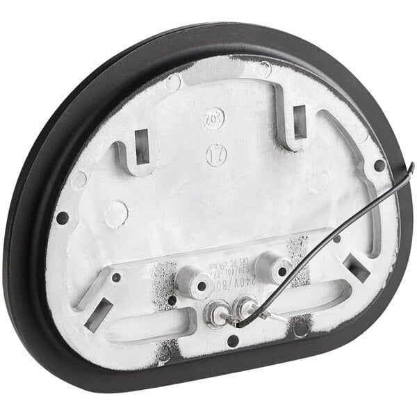 A black and silver round heating element with a wire.