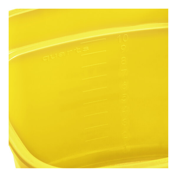 A yellow cleaning pail with quart measurement markings on the inside.
