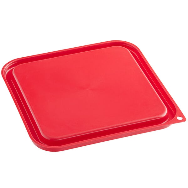 A red square Carlisle food storage container lid on a red square container.