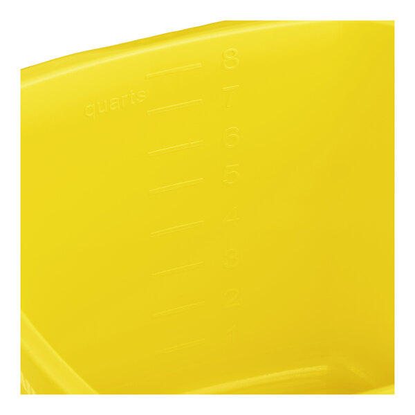 A yellow cleaning pail with quart measurement markings on the inside.