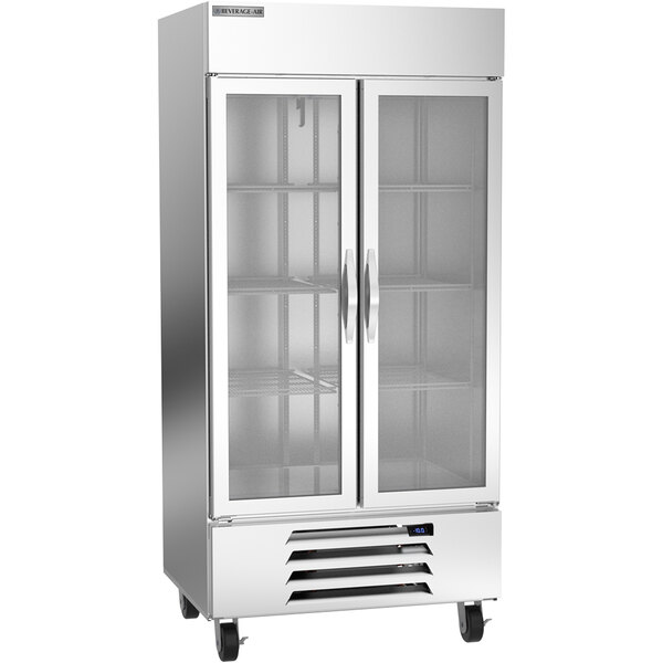 A silver Beverage-Air reach-in freezer with glass doors on a white background.