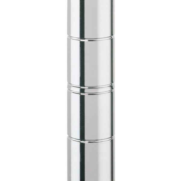 A stainless steel cylinder with a silver finish and a yellow cap.