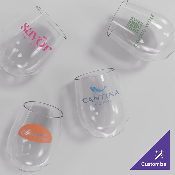 A group of clear Acopa Endure Tritan plastic stemless wine glasses with a green logo.