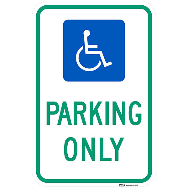 A blue aluminum parking lot sign with white wheelchair symbol and text that reads "Handicapped Parking Only"