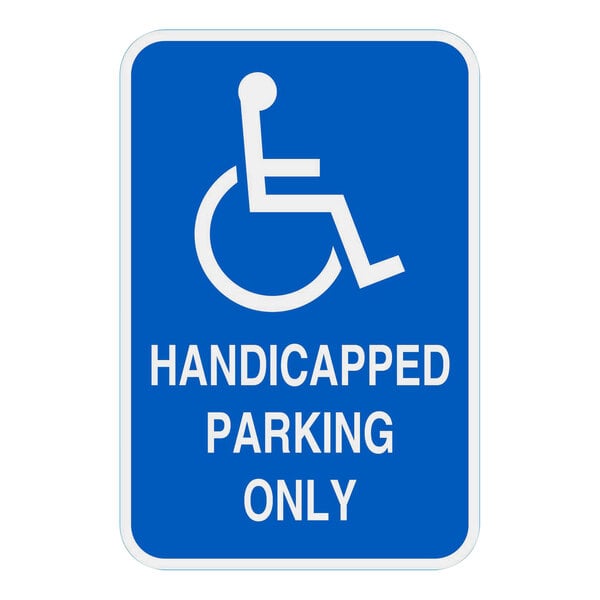 A blue sign with white text that reads "Handicapped Parking Only"