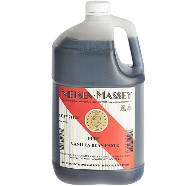 A gallon of Nielsen-Massey Pure Vanilla Paste with a label.