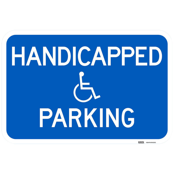 A blue aluminum parking lot sign with white text that says "Handicapped Parking"