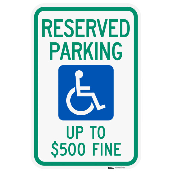 A green and white aluminum parking sign that reads "Handicapped Reserved Parking / Up To $500 Fine" with a wheelchair symbol.